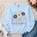 God Is Working Christian Crewneck Sweatshirt in Light Blue