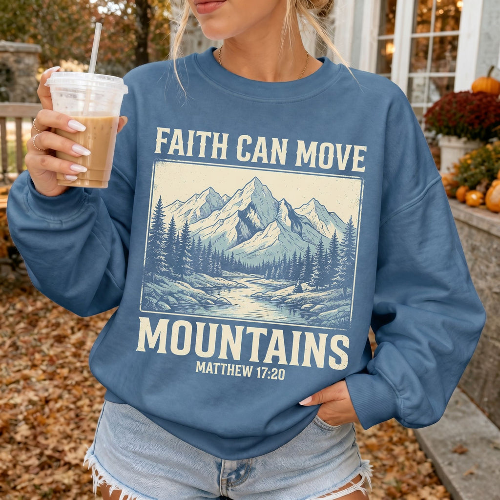 Woman wearing Faith Can Move Mountains Christian sweatshirt in Indigo Blue