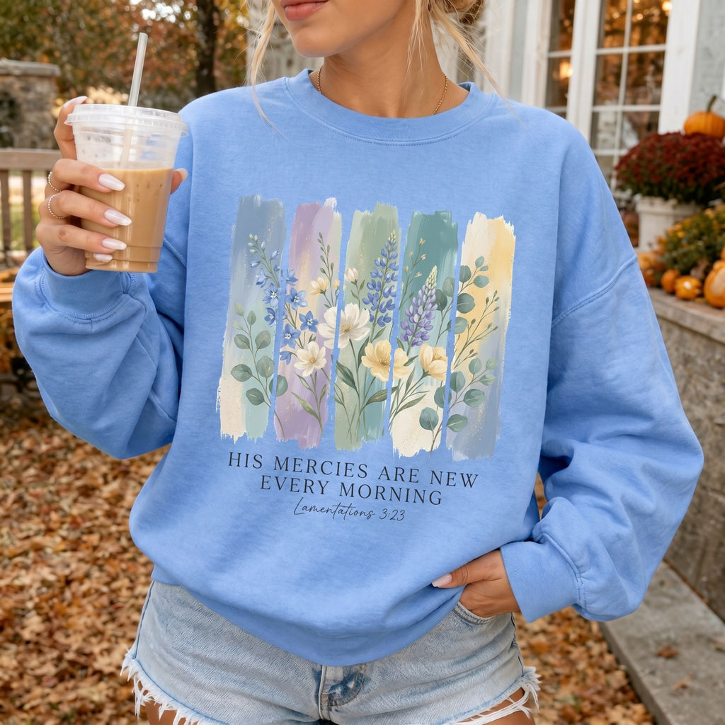 Woman wearing His Mercies Are New Every Morning Christian sweatshirt in Carolina Blue