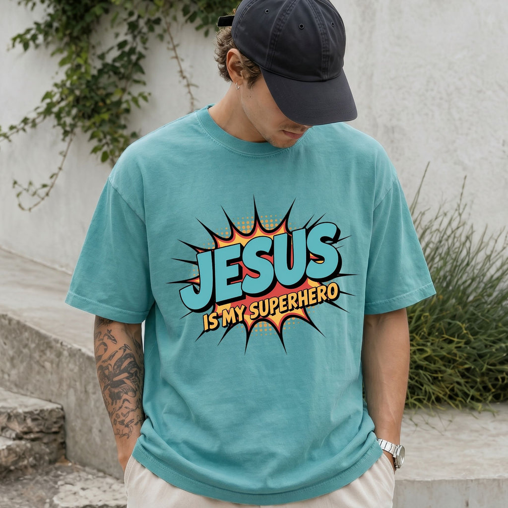 Man wearing Jesus Is My Superhero Christian Comfort Colors T-Shirt in Seafoam