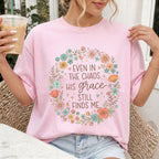 Woman wearing Even in the Chaos His Grace Still Finds Me Christian Comfort Colors T-Shirt in Blossom
