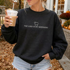 Woman wearing The Lord Is My Shepherd Christian sweatshirt in Black
