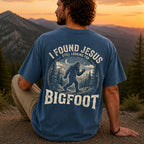 Man wearing I Found Jesus Still Looking for Bigfoot Christian Comfort Colors T-Shirt in Midnight