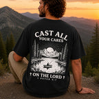 Man wearing Cast All Your Cares on the Lord Christian Comfort Colors T-Shirt in Black