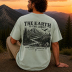 Man wearing The Earth Is the Lord's Christian Comfort Colors T-Shirt in Bay