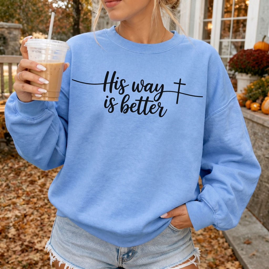 Woman wearing His Way Is Better Christian sweatshirt in Carolina Blu