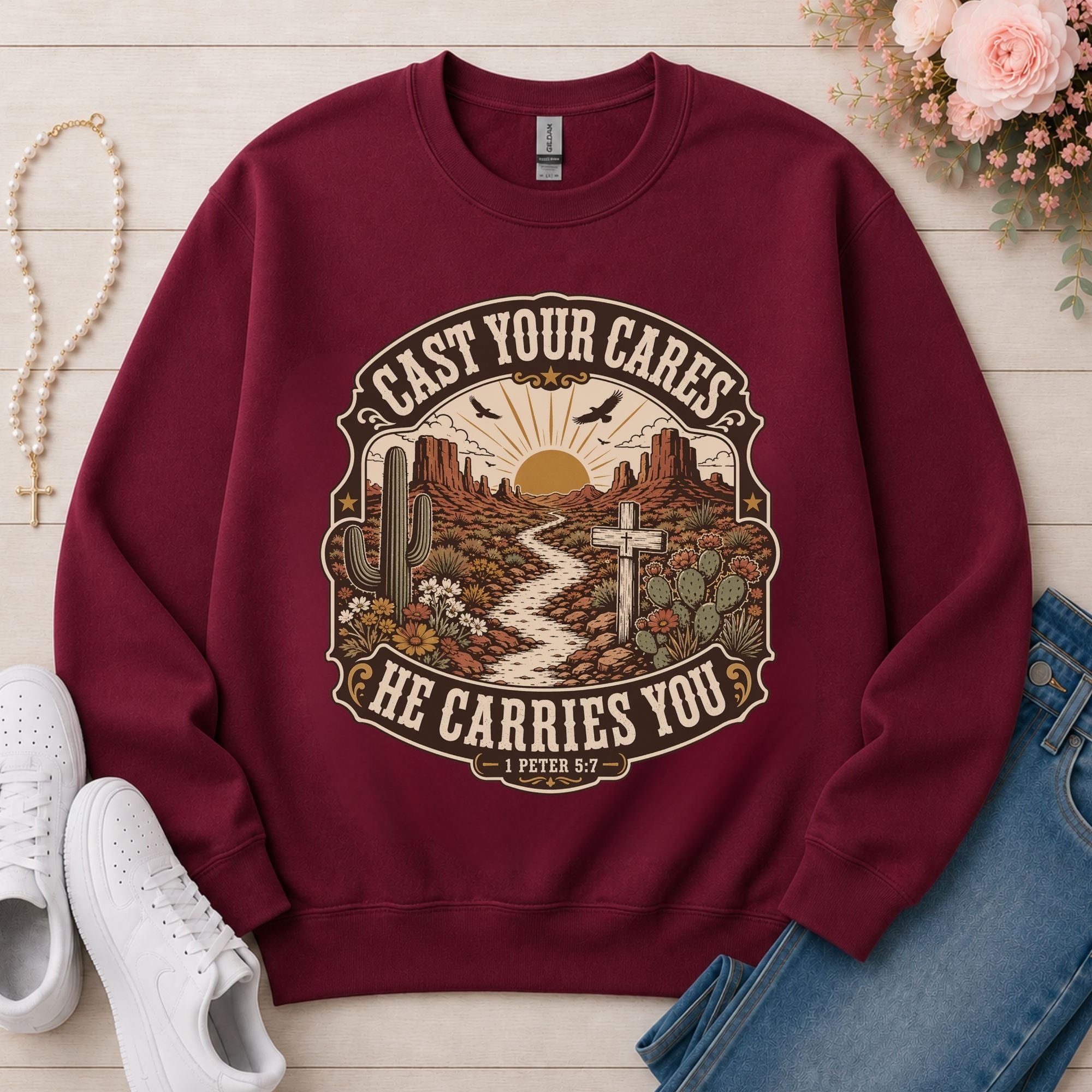 Cast Your Cares He Carries You Christian sweatshirt in Maroon