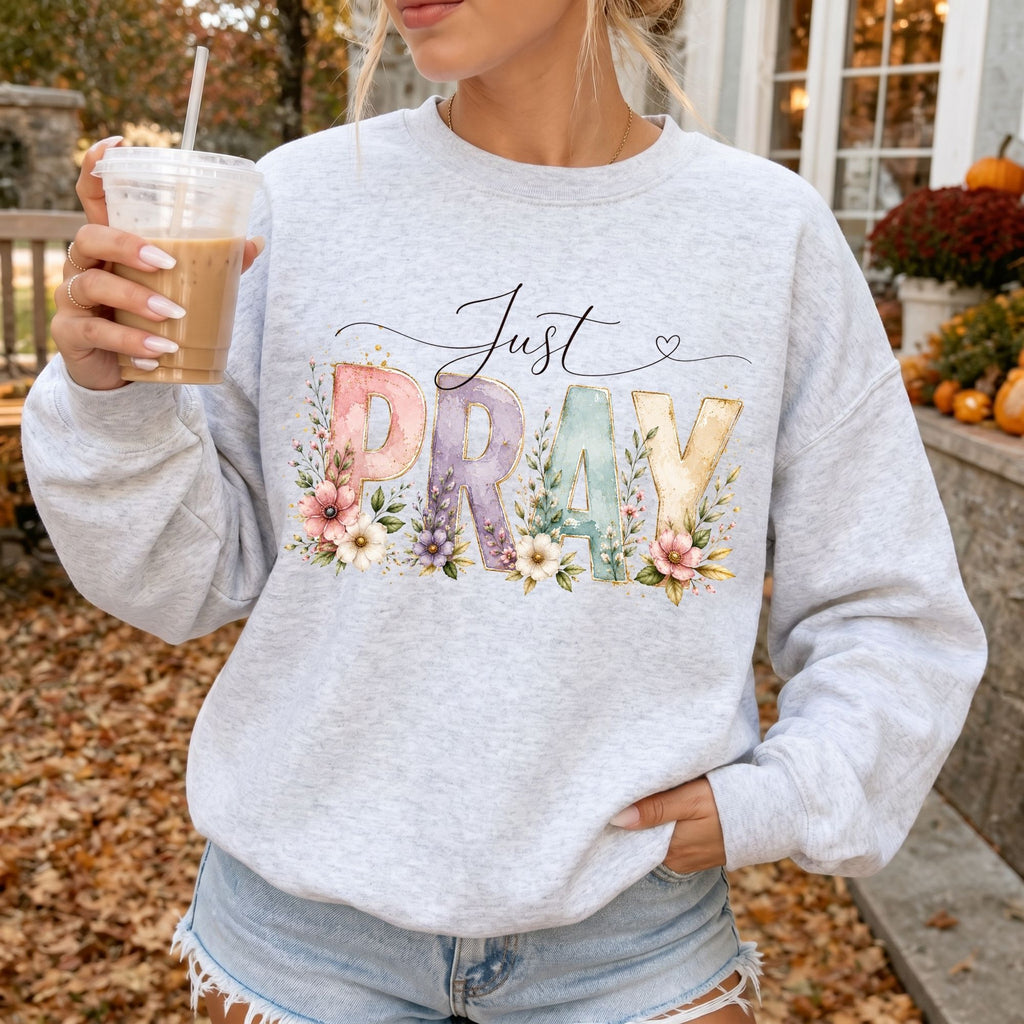 Woman wearing Just Pray Christian sweatshirt in Ash