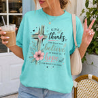 Woman wearing Give Thanks Believe Hope Christian Comfort Colors T-Shirt in Chalky Mint