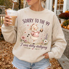 Woman wearing Sorry to the 99 I Was Dilly Dallying Christian sweatshirt in Sand