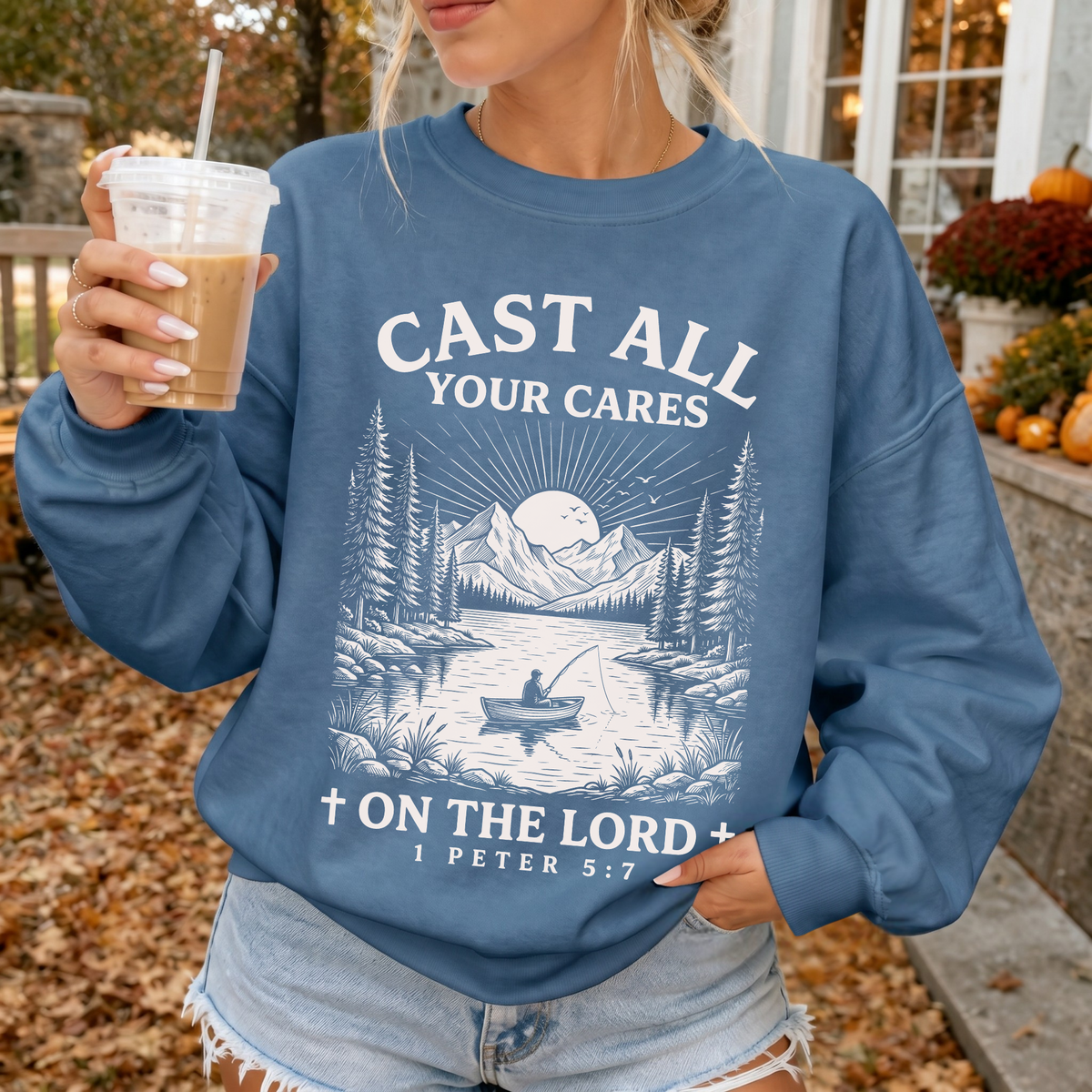 Woman wearing Cast All Your Cares On The Lord Christian sweatshirt in Indigo Blue