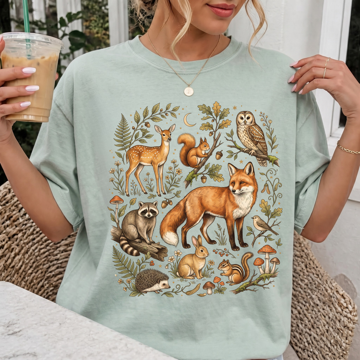 Woman wearing Vintage Woodland Animals Fall Comfort Colors T-Shirt in Bay