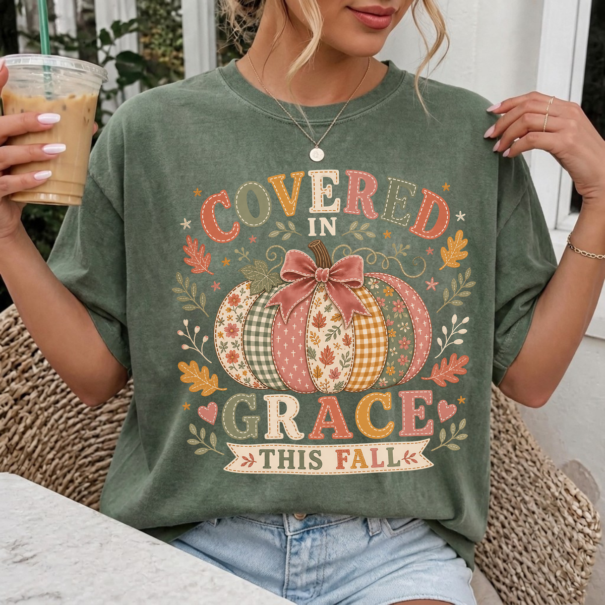 Woman wearing Covered in Grace This Fall Christian Comfort Colors T-Shirt in Moss