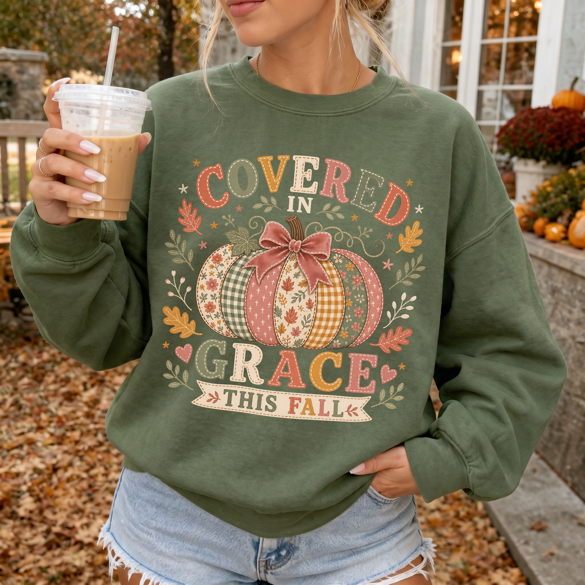 Woman wearing Covered in Grace This Fall Christian Crewneck Sweatshirt in Military Green