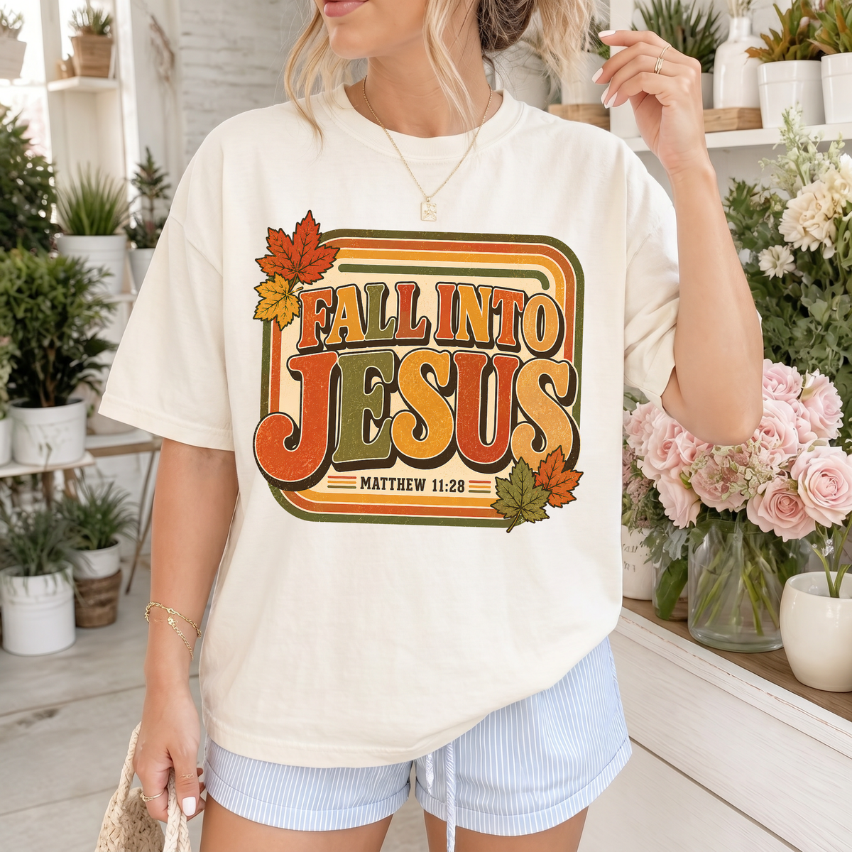 Woman wearing Fall Into Jesus Christian Comfort Colors T-Shirt in Ivory