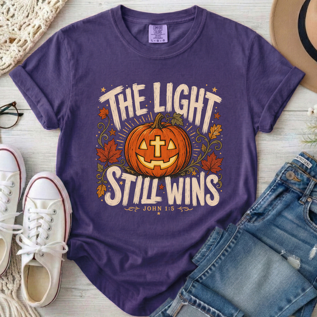 The Light Still Wins Christian Comfort Colors T-Shirt in Grape