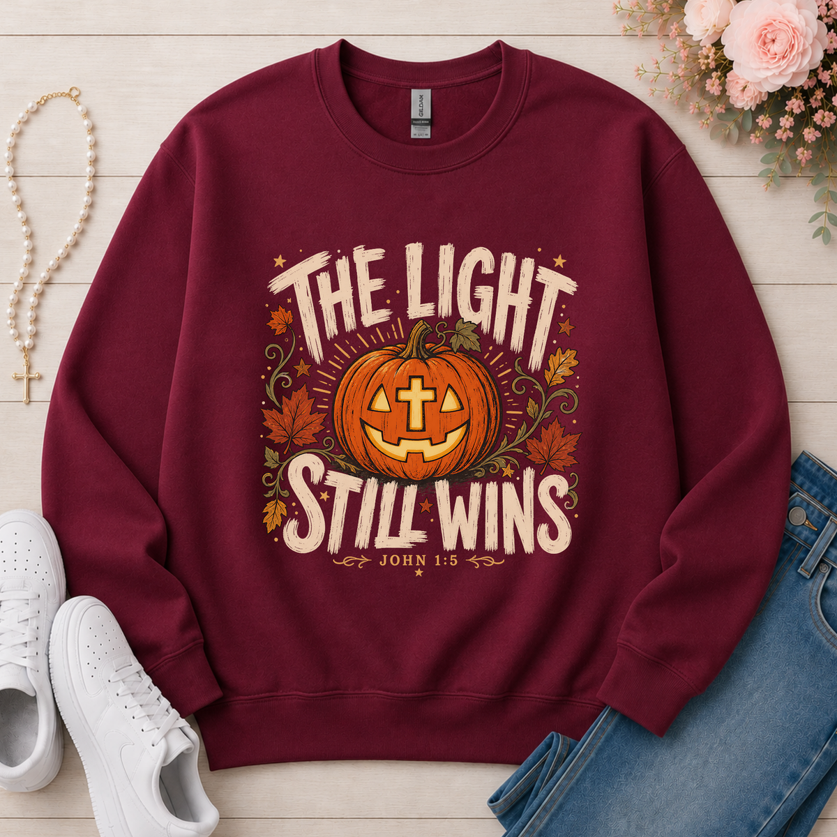 The Light Still Wins Christian Crewneck Sweatshirt in Maroon