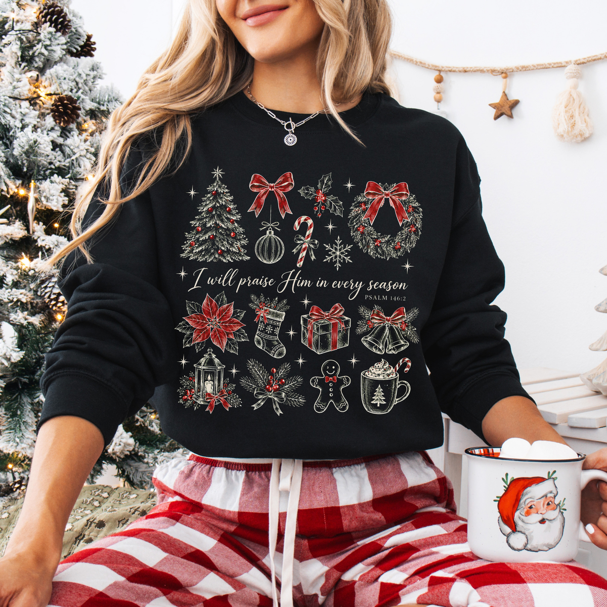 Woman wearing I Will Praise Him in Every Season Christmas Christian Crewneck Sweatshirt in Black