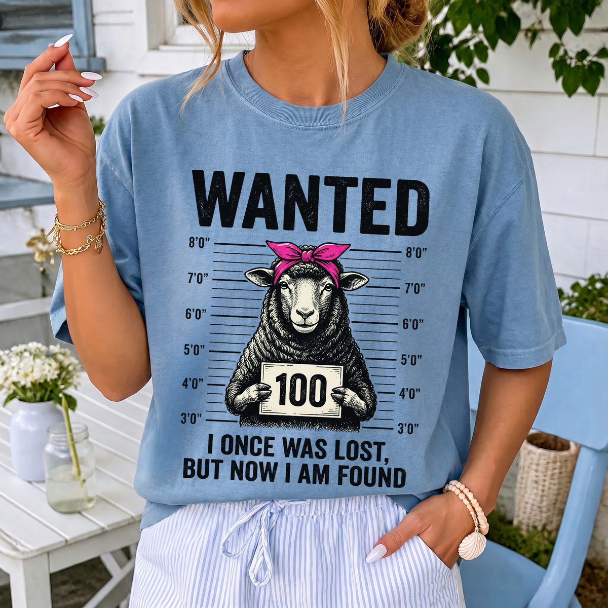 Woman wearing Wanted Sheep Lost But Found Christian Comfort Colors T-Shirt in Washed Denim